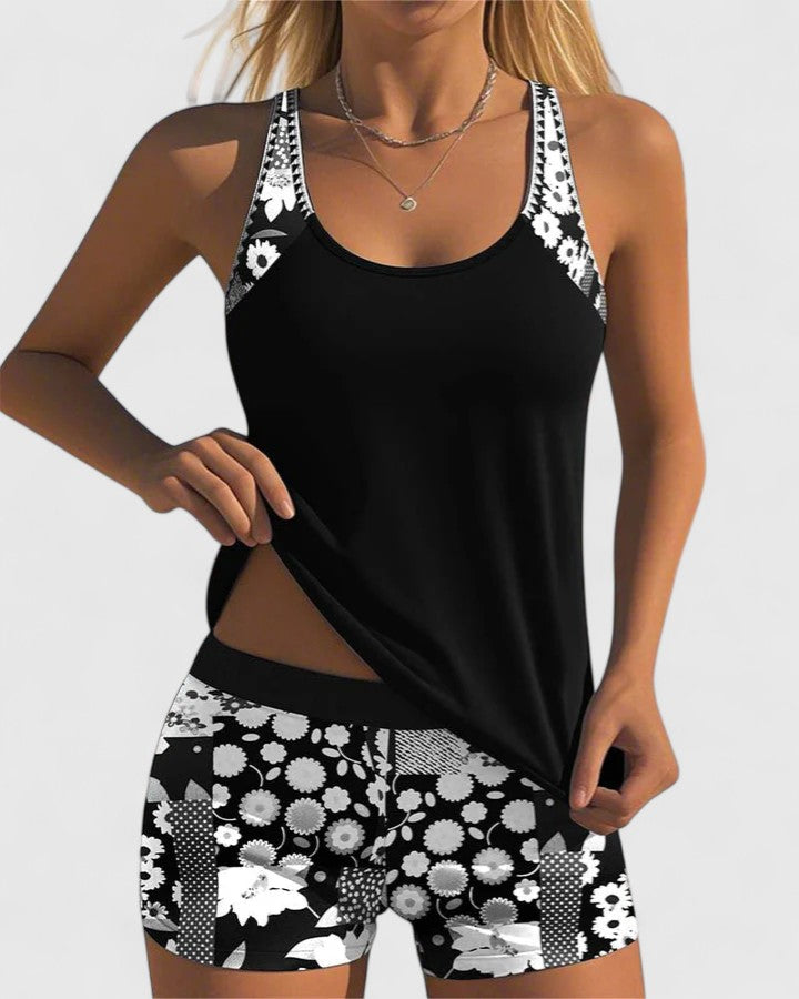 Fashionable women's floral tankini swimsuit for summer vacation, resort wear & beach activities.