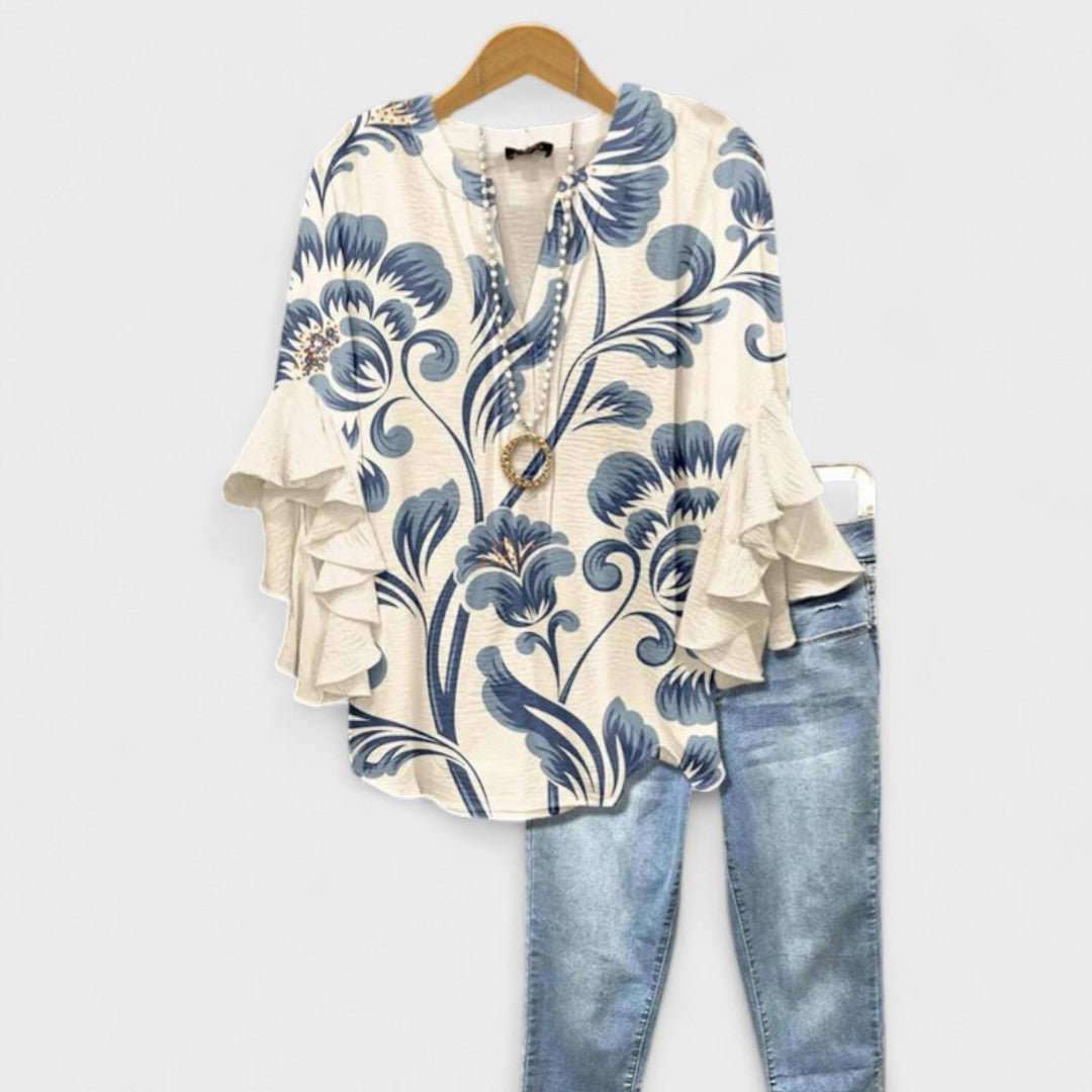 Women's floral print V-neck blouse with elegant ruffle sleeves, perfect for summer casual chic.