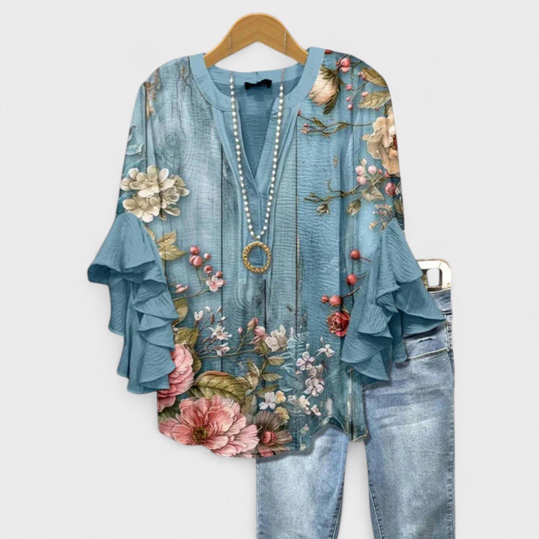 Summer fashion women's V-neck blouse, lightweight with a beautiful floral print and trendy ruffle sleeves.