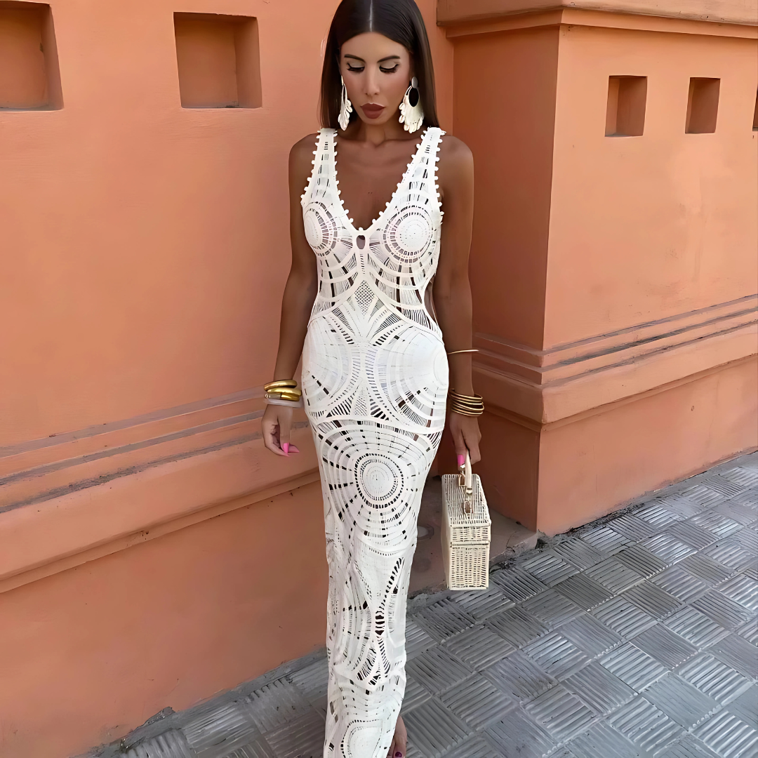 Women's floral sleeveless maxi dress, perfect for summer. Flowy and elegant beachwear.