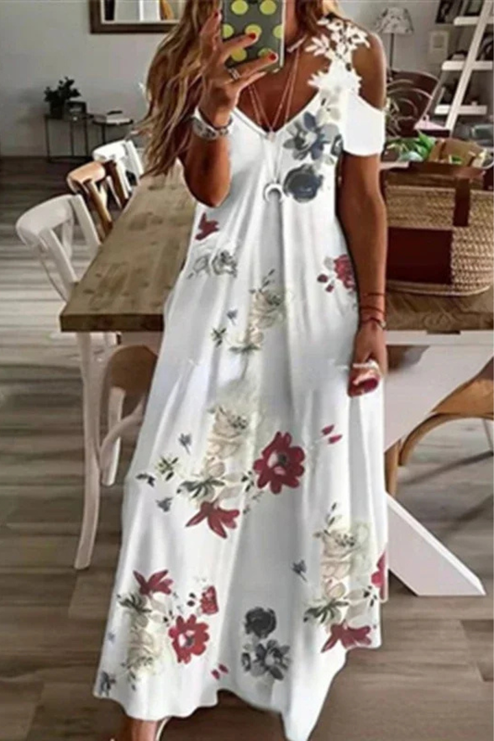 Vibrant floral pattern sleeveless maxi dress for women, an ideal summer vacation outfit or day dress.