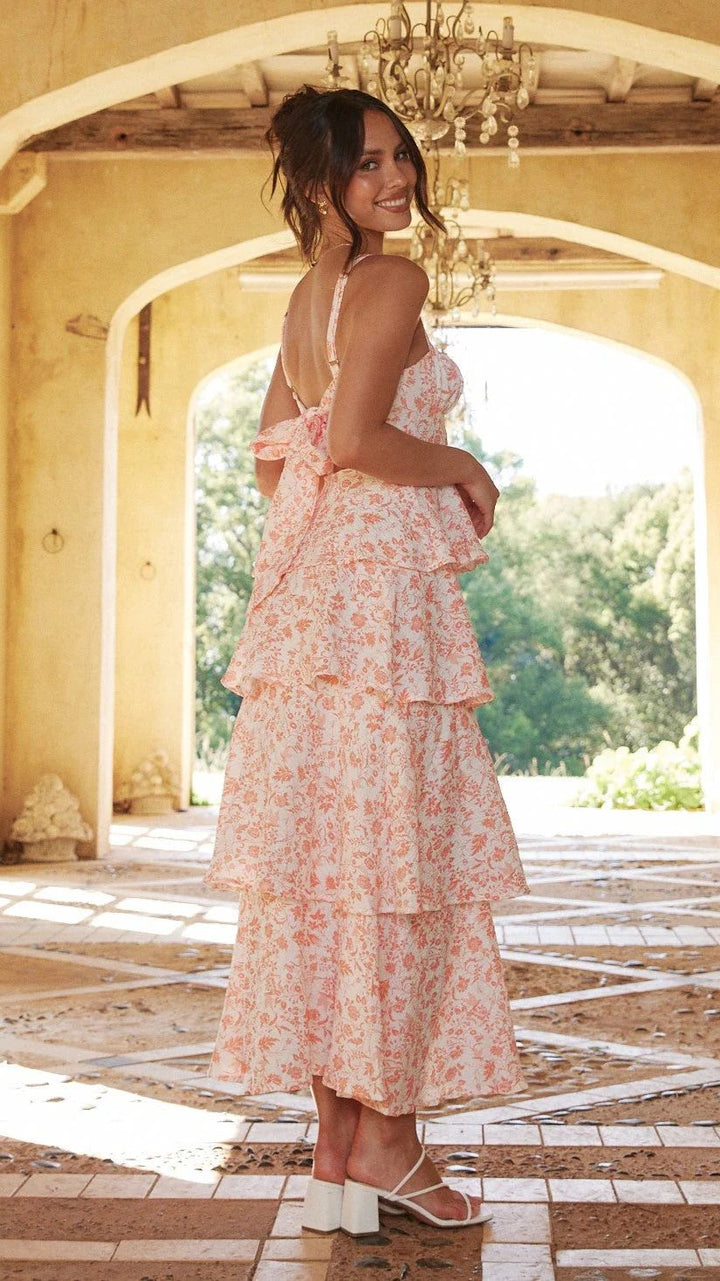 Vibrant floral print tiered maxi dress for women with an elegant square neck, perfect for celebrations.