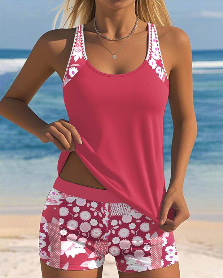 Women's floral two-piece bikini set, comfortable & stylish beachwear for summer vacations.
