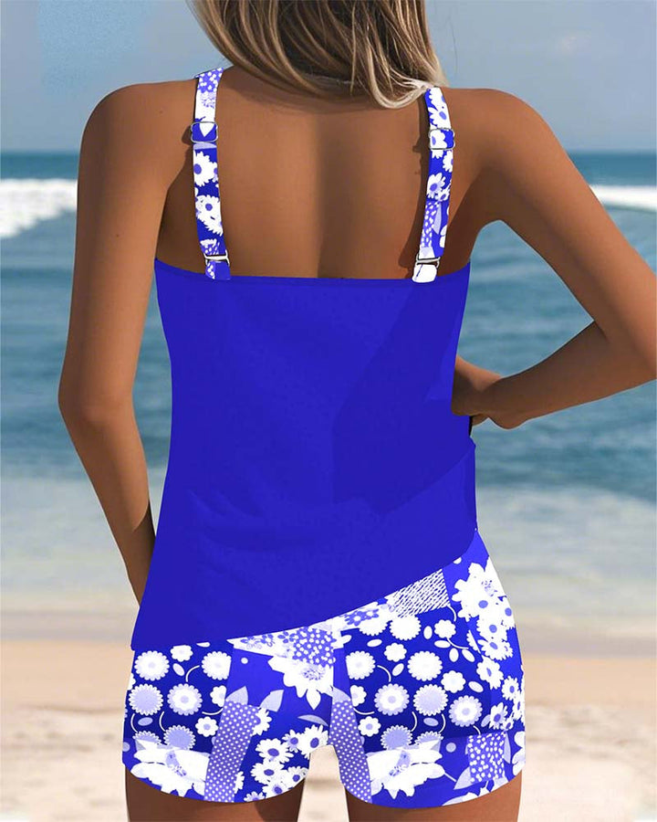 Full view of a women's floral two-piece bikini, featuring comfortable design and vibrant summer beach style.