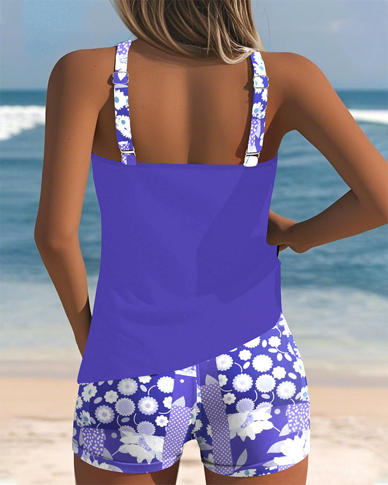 Vibrant floral two-piece bikini for women, ideal for swimming, sunbathing, and summer beach activities.