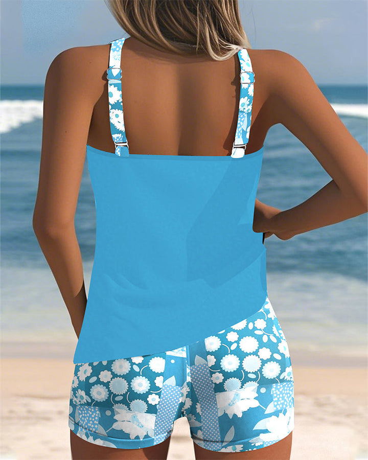 Eye-catching floral print women's two-piece bikini, comfortable summer beachwear for stylish poolside fun.