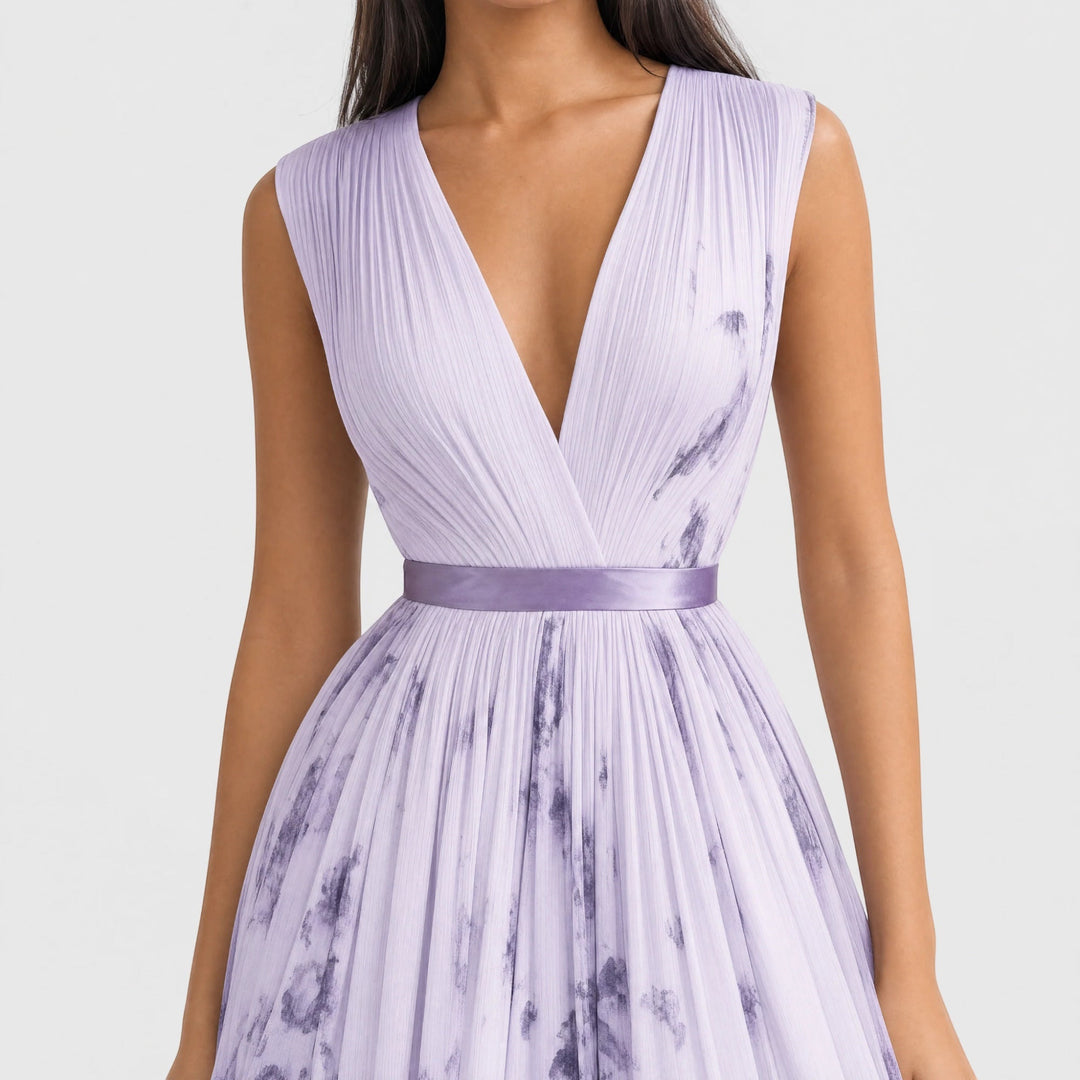 Chic floral V-neck pleated midi dress for women, ideal for summer gatherings.