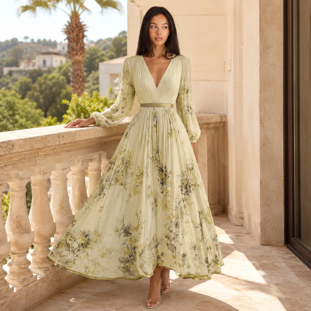 Women's sleeveless floral V-neck A-line midi dress, ideal for summer parties.