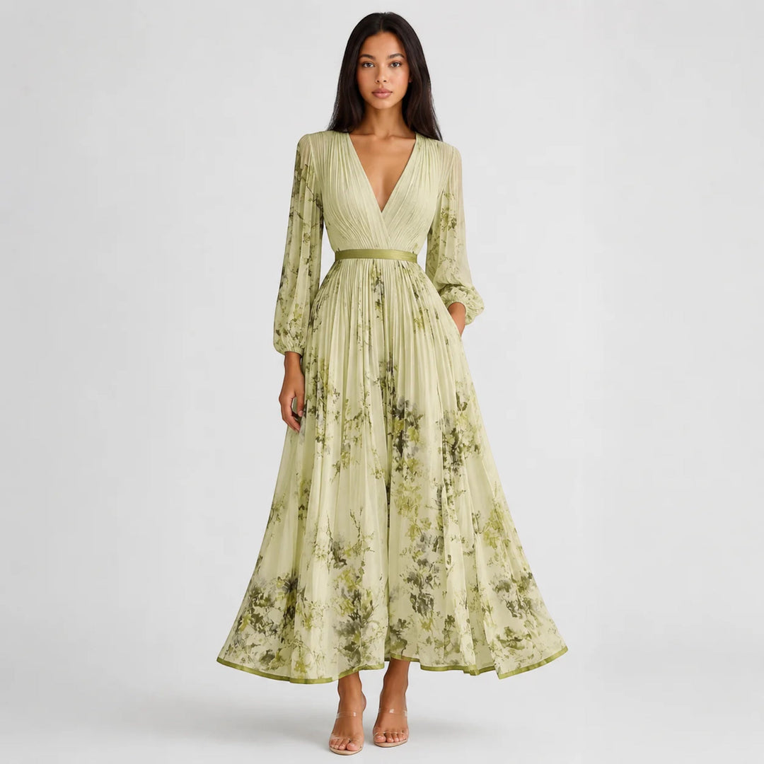Casual women's A-line pleated midi dress with vibrant floral design, sleeveless.