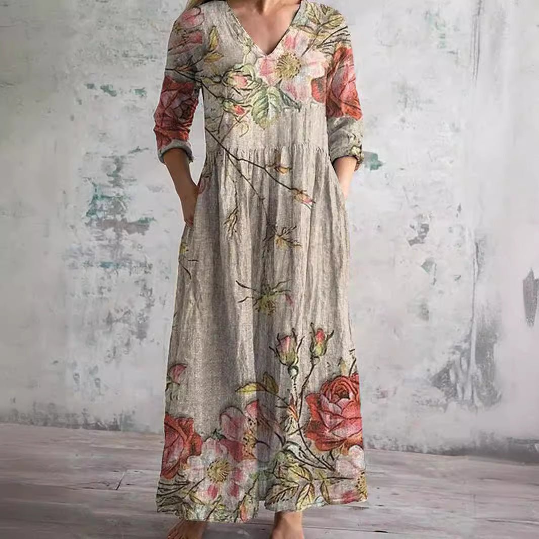 Women's floral V-neck maxi dress with three-quarter sleeves, perfect for effortless summer style.