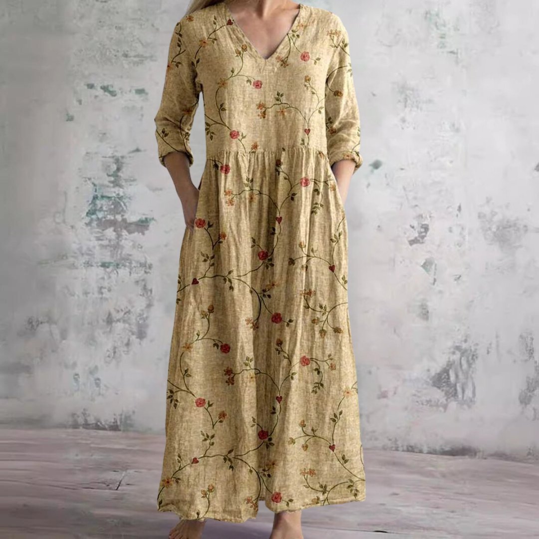 Casual yet elegant women's floral maxi dress, three-quarter sleeve, designed for comfortable summer fashion.