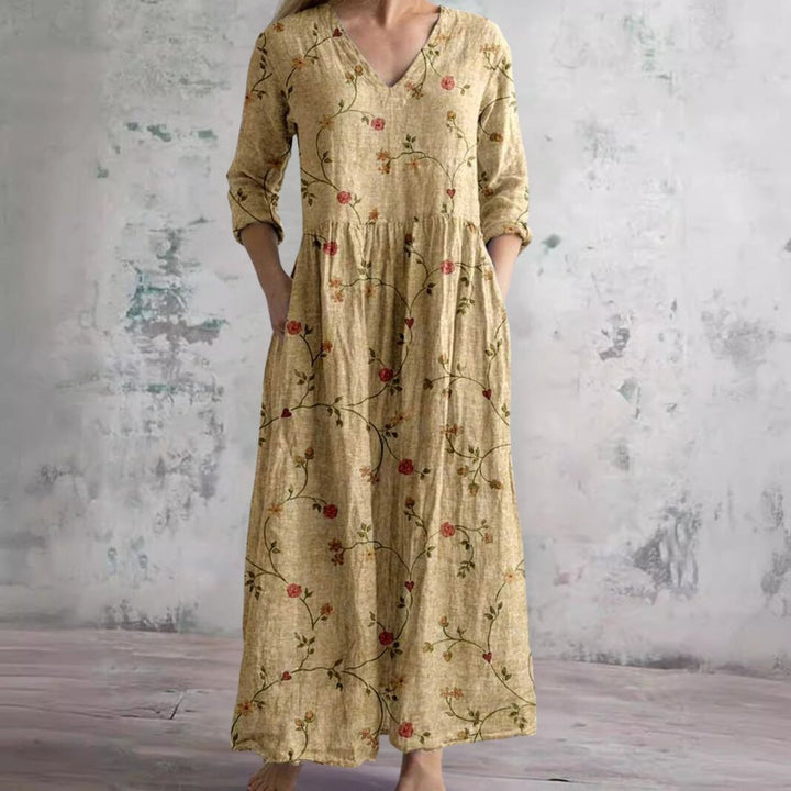 Casual yet elegant women's floral maxi dress, three-quarter sleeve, designed for comfortable summer fashion.