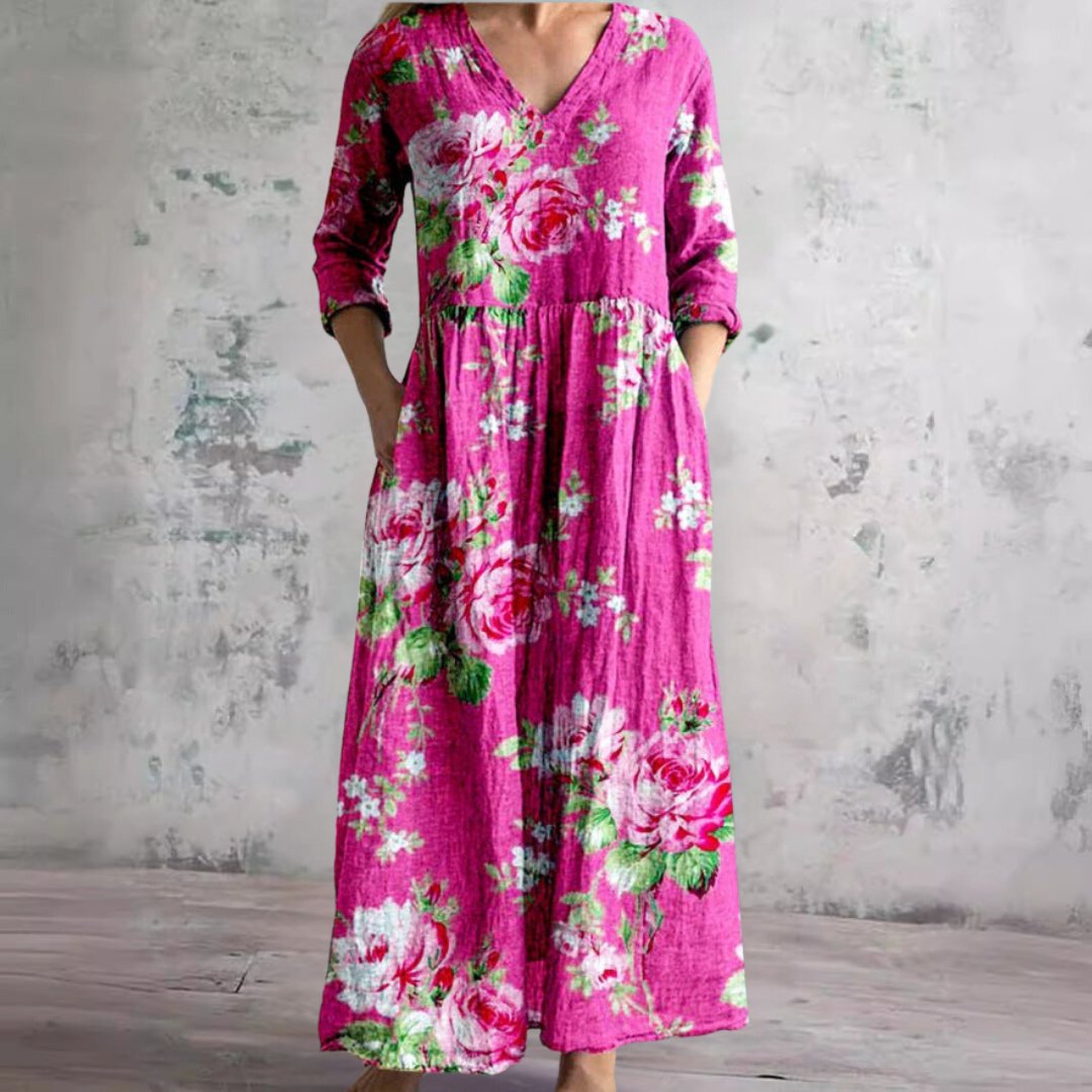 Stylish women's V-neck floral dress, long and comfortable, perfect for sunny summer days.