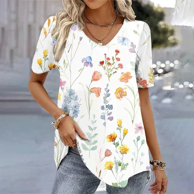 Women's floral V-neck short sleeve top. Relaxed fit, perfect for casual summer style & everyday wear.