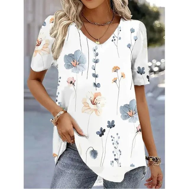 Botanical floral print women's V-neck top. Flowy, short sleeve blouse for comfortable spring & summer fashion.