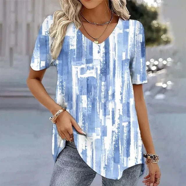Chic women's short sleeve floral V-neck top. Relaxed fit blouse, ideal for casual summer fashion & comfort.