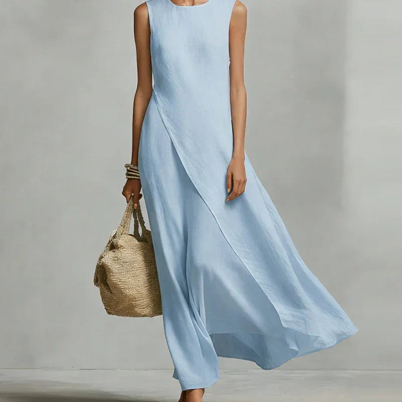Women's flowing asymmetrical maxi dress, sleeveless with a relaxed fit. Ideal for summer and casual wear.