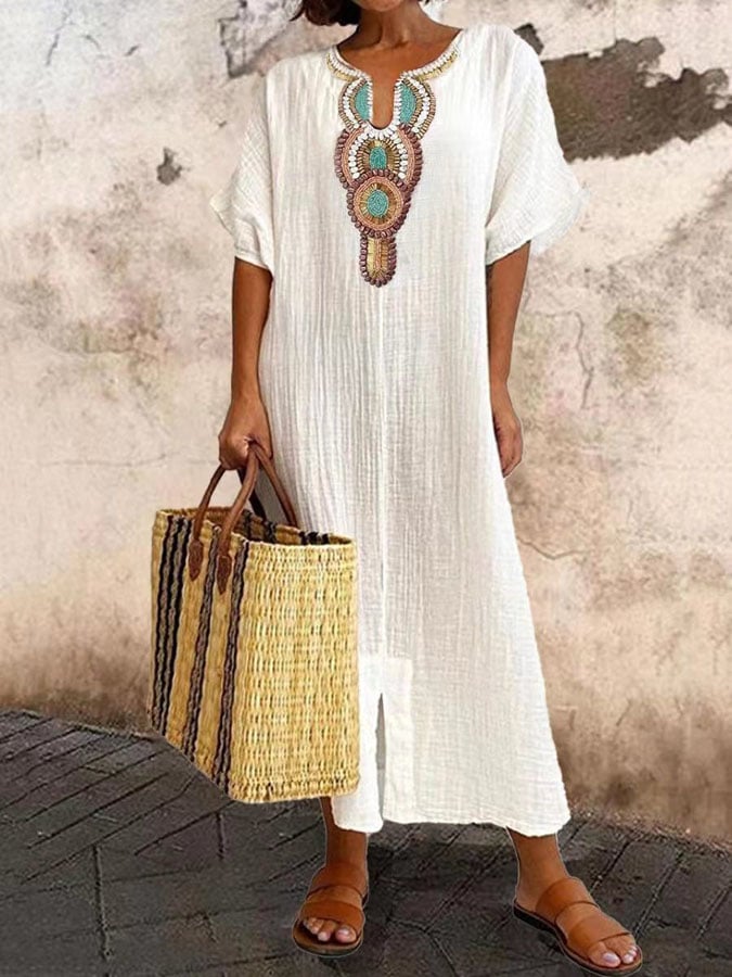 Women's flowing kaftan dress for effortless summer elegance. Perfect loose-fit maxi dress for vacation & resort wear.