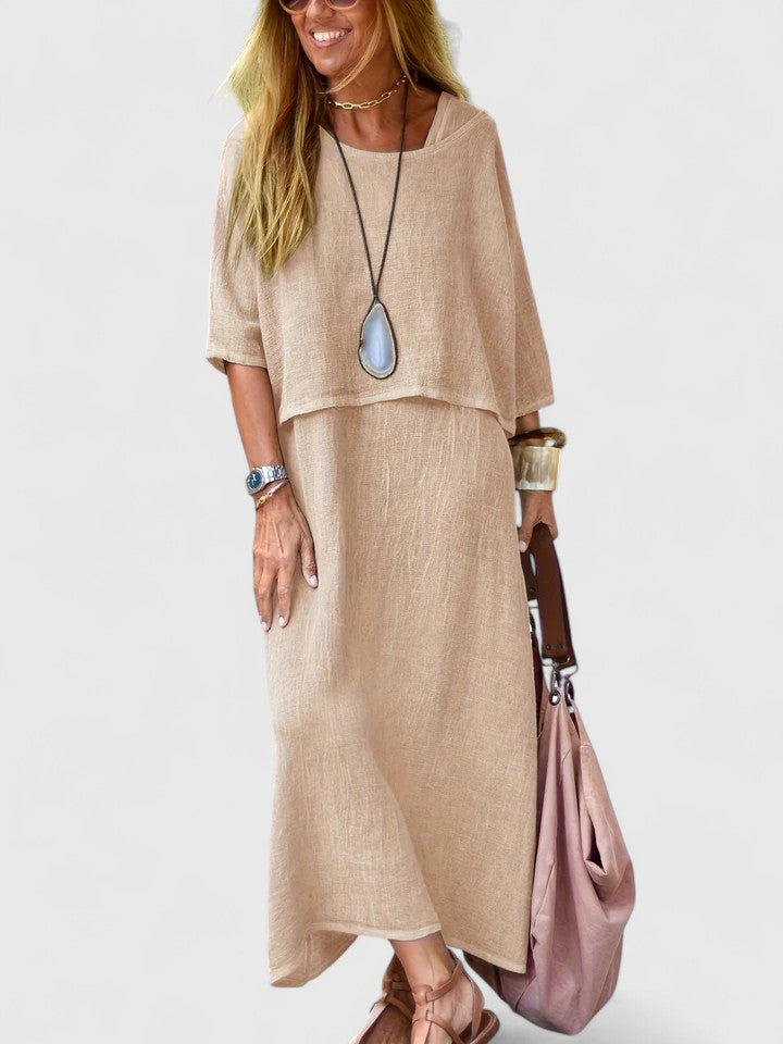 Elegant flowing women's maxi dress with layers, perfect for a relaxed and airy summer look.