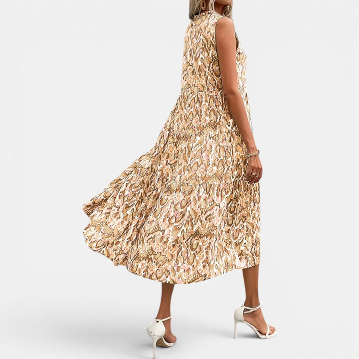 Boho chic women's flowing midi dress, sleeveless and comfortable, great for summer days.