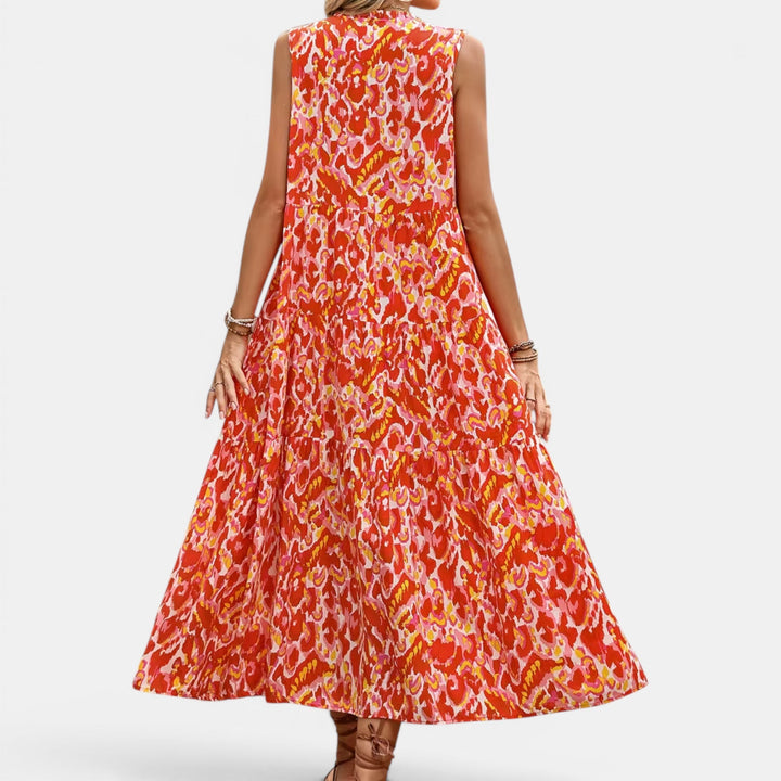 Women's flowing sleeveless V-neck midi dress, boho style, ideal for beach vacations.