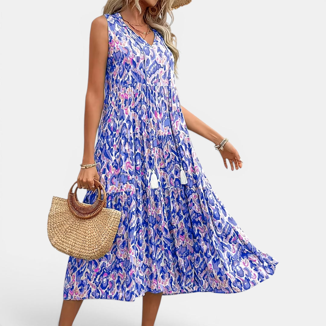 Women's V-neck flowing boho midi dress, sleeveless for ultimate summer comfort and style.
