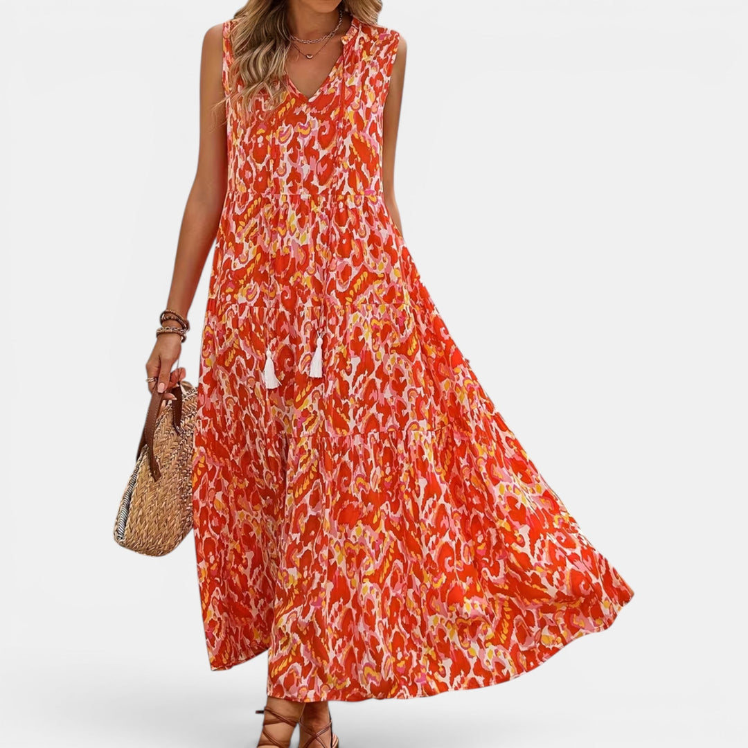 Chic women's sleeveless boho midi dress with a flowing silhouette, ideal for summer casual style.