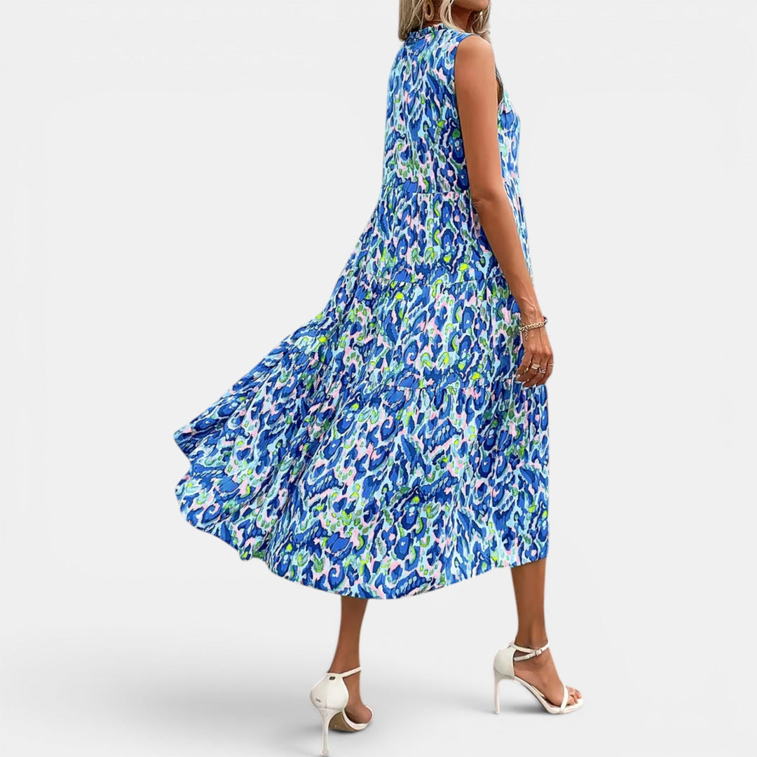 Relaxed fit women's sleeveless midi dress, flowing boho design, ideal for casual summer.