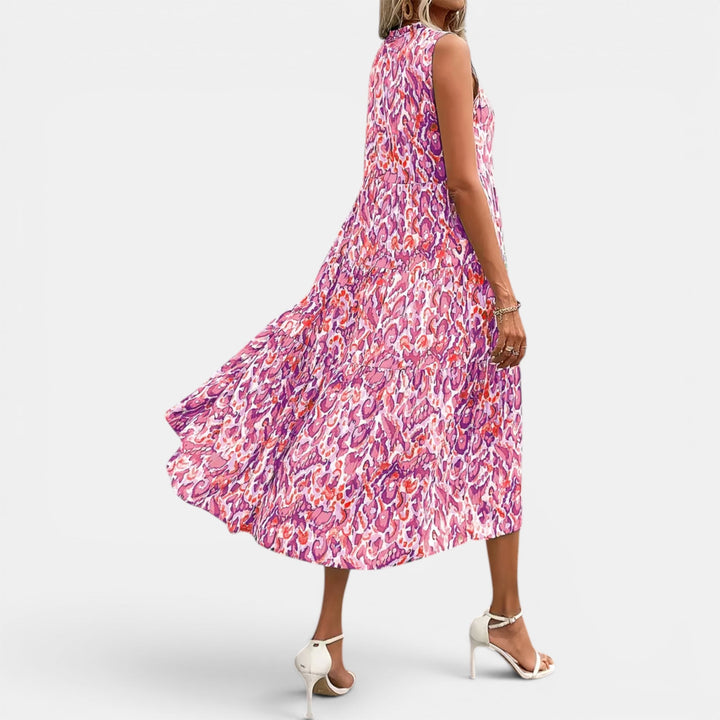 Women's stylish beach-ready dress, sleeveless flowy boho midi, perfect for seaside trips.