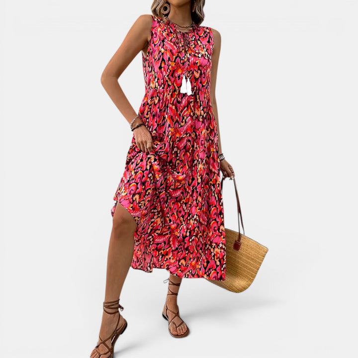 Women's boho midi dress, sleeveless and flowing, designed for comfort and summer fashion.