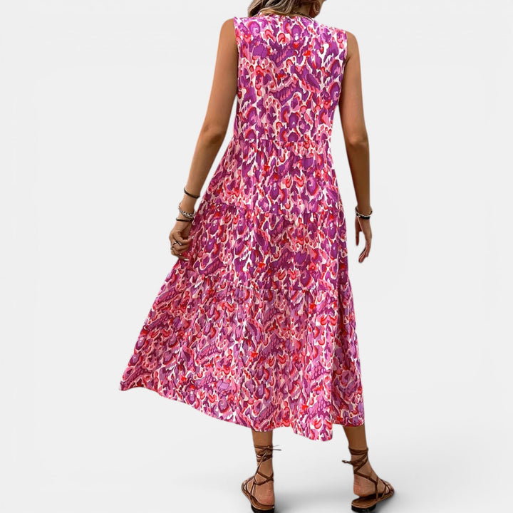 Women's chic summer midi dress, sleeveless and flowing boho, perfect for a relaxed vibe.