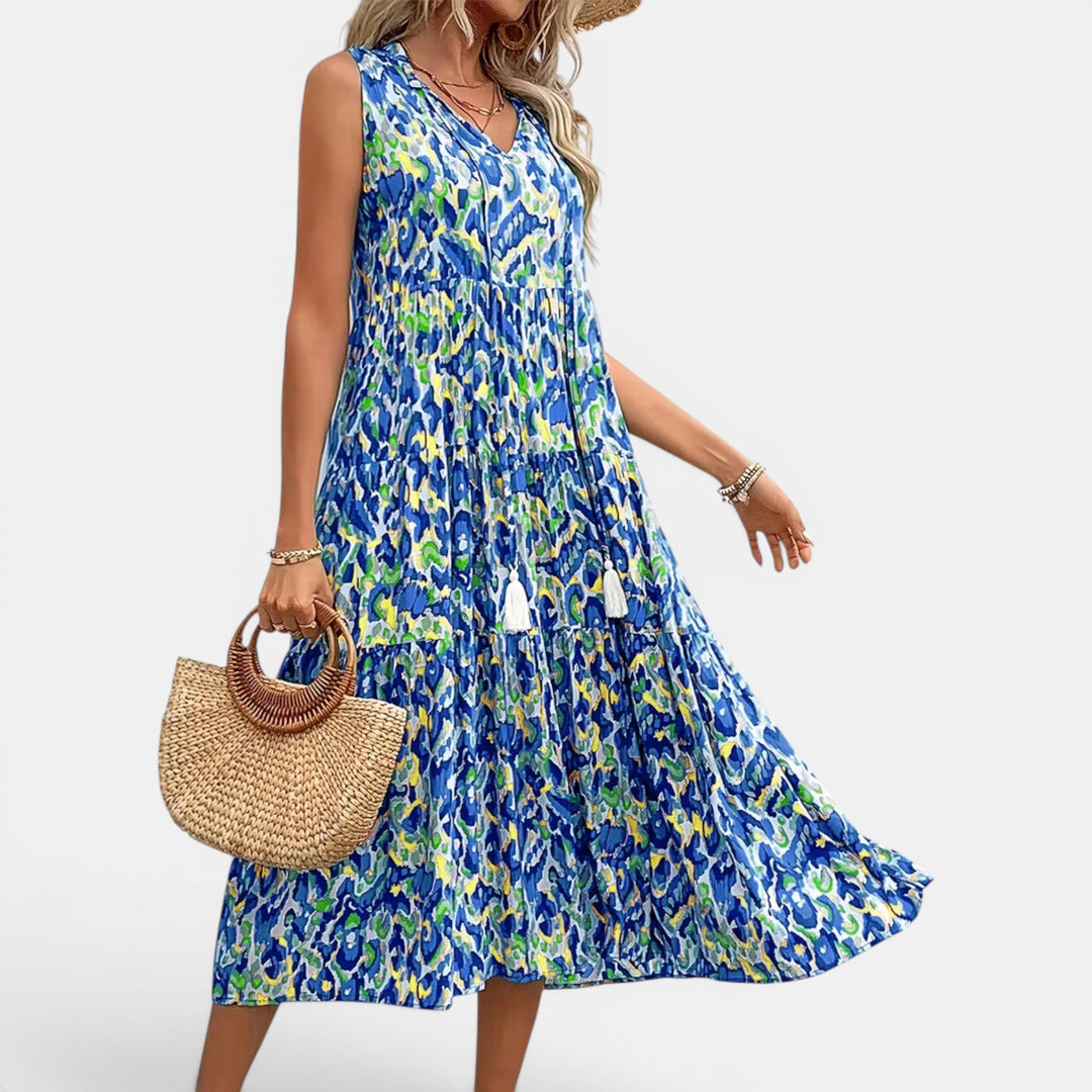 Women's versatile sleeveless summer dress, flowing boho midi, ideal for beach or casual.