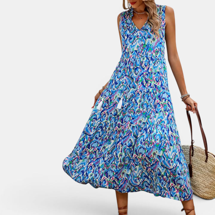 Elegant V-neck women's midi dress, sleeveless and flowy boho design, great for summer and beach.