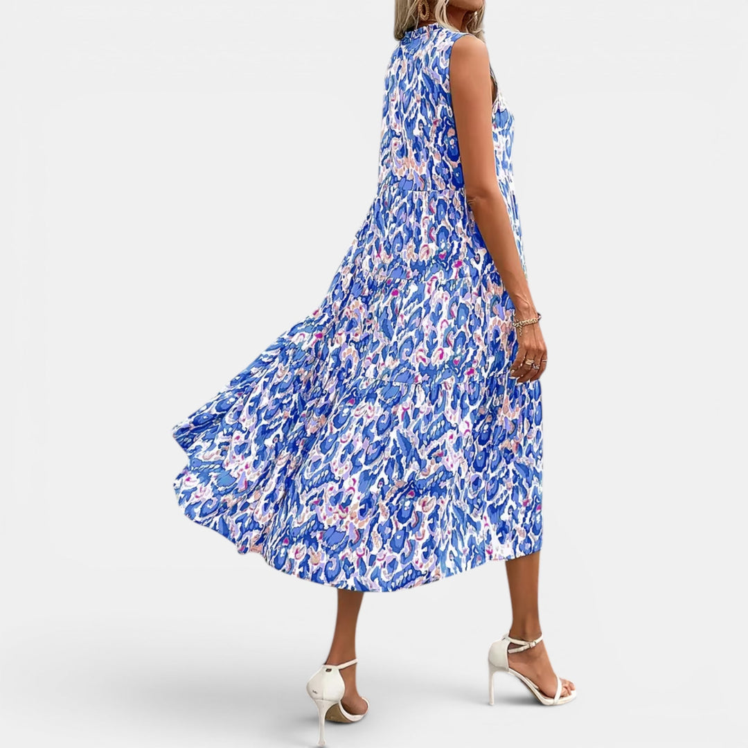 Women's elegant sleeveless flowing midi dress, boho chic style, perfect for summer events.
