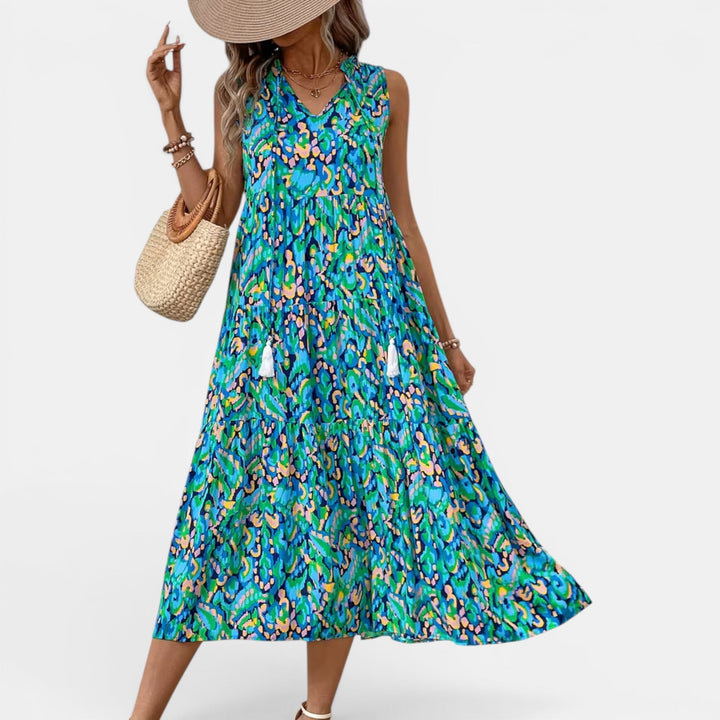 Beautiful women's beach dress, sleeveless flowy boho midi design, perfect for sunny days.