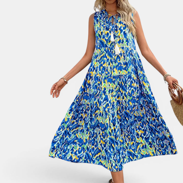 Versatile women's boho midi dress, sleeveless and flowing, suitable for summer casual events.