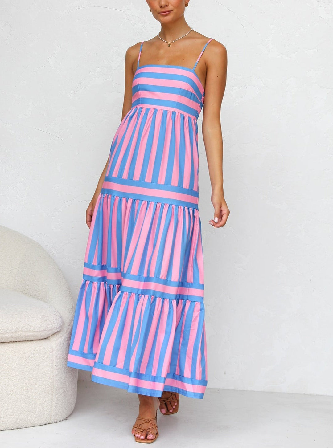 Gorgeous women's floor-length striped tiered maxi dress, ideal for an elegant summer evening.