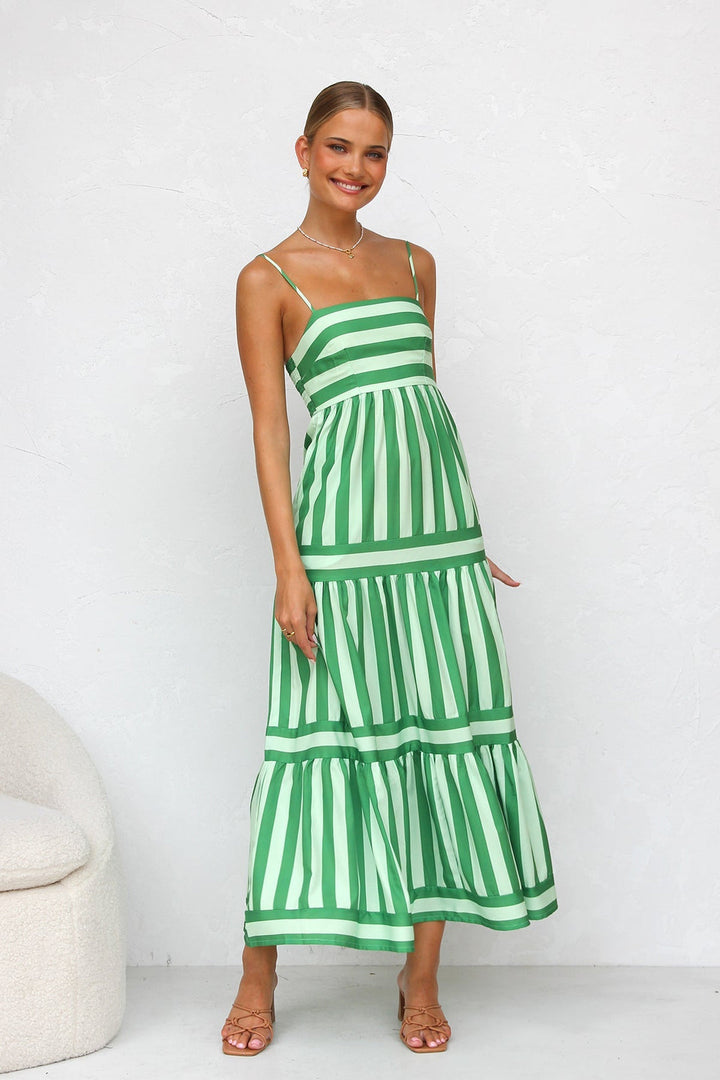 Versatile women's day dress: flowing striped maxi with a beautiful tiered design.
