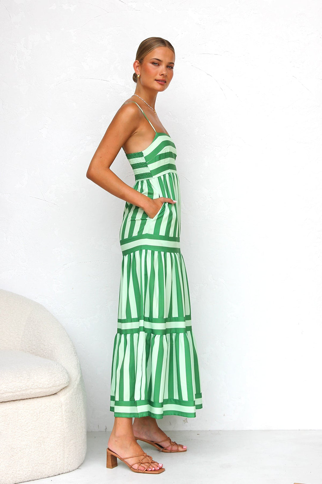 Summer-ready women's maxi dress, striped and tiered, ideal for a flowing look.