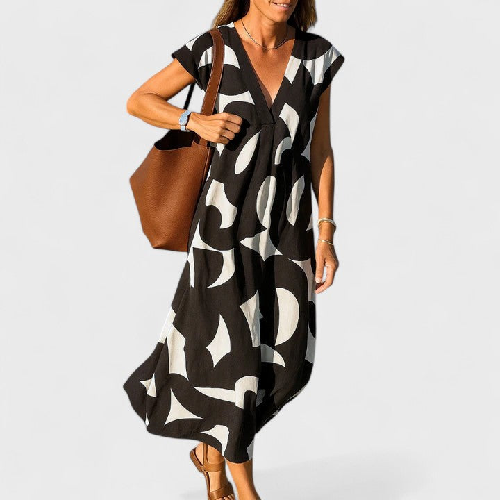 Comfortable women's casual V-neck flowing dress, perfect for warm summer days or vacation.