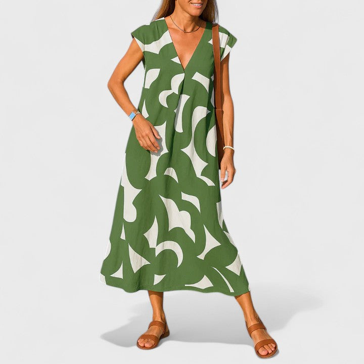 Chic women's V-neck flowing dress, offering an effortless elegant look for casual or holiday wear.