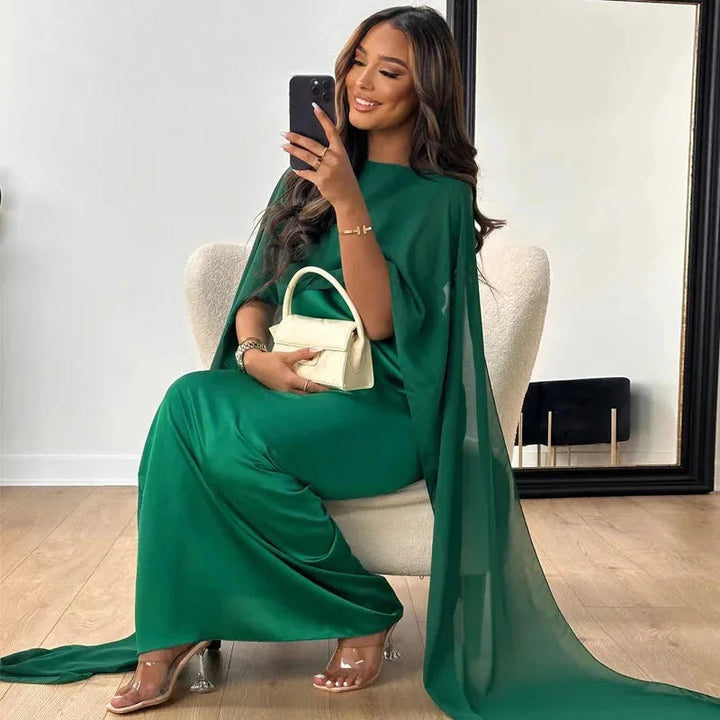 Women's elegant flowy maxi dress with batwing sleeves. Relaxed, comfortable fit suitable for various casual to special occasions.