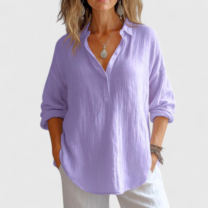 Stylish women's blouse with a comfortable, flowy design. Perfect for effortless elegance & versatile spring/summer fashion.