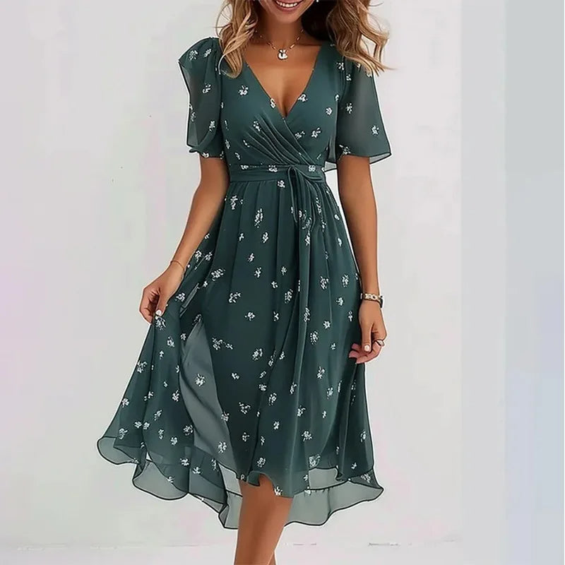 Women's V-neck floral summer dress, knee-length & flowy, with short sleeves, great for everyday chic.