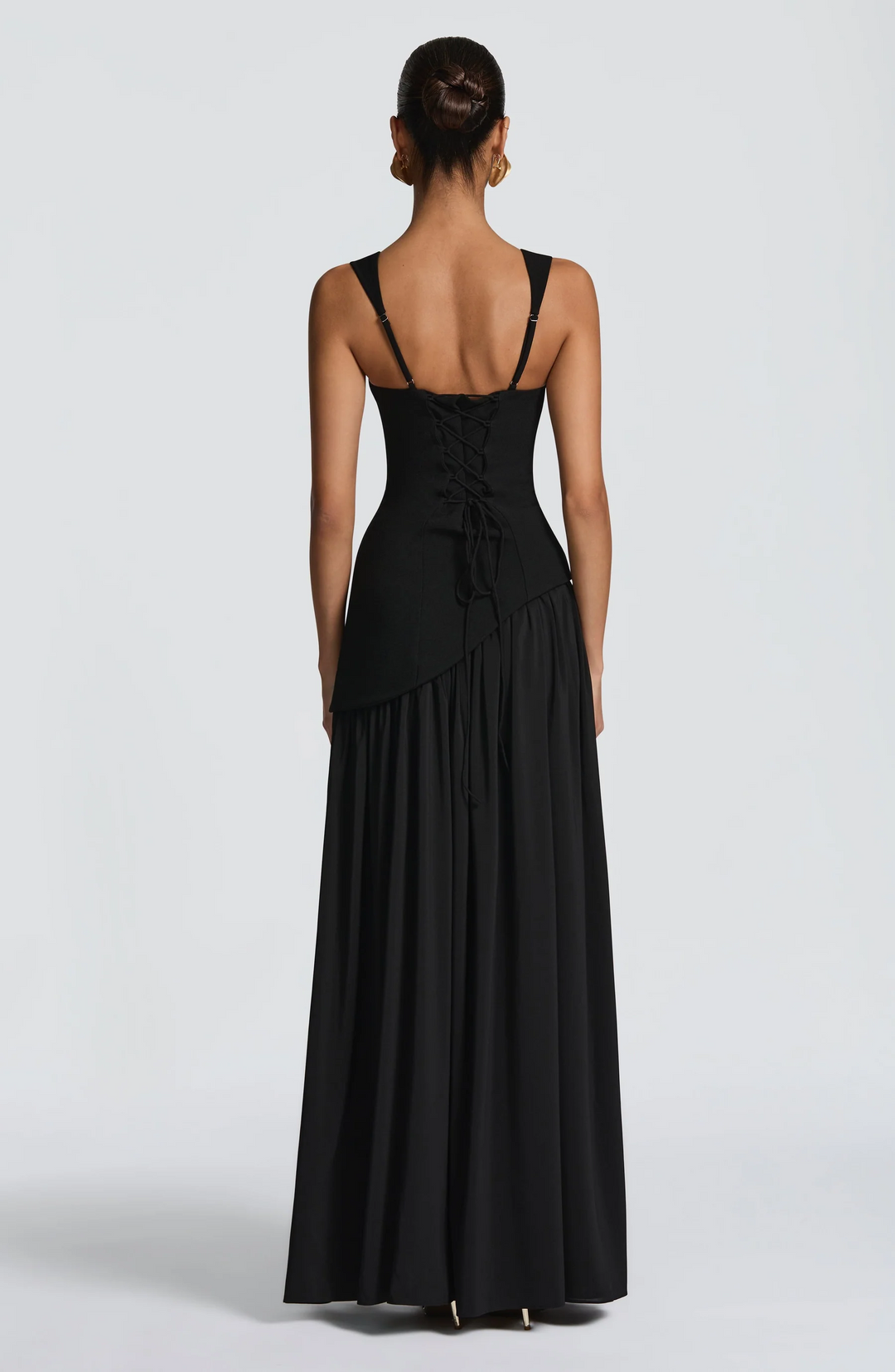 Long women's flowy dress with adjustable spaghetti straps. Comfortable and stylish for summer, day or evening.