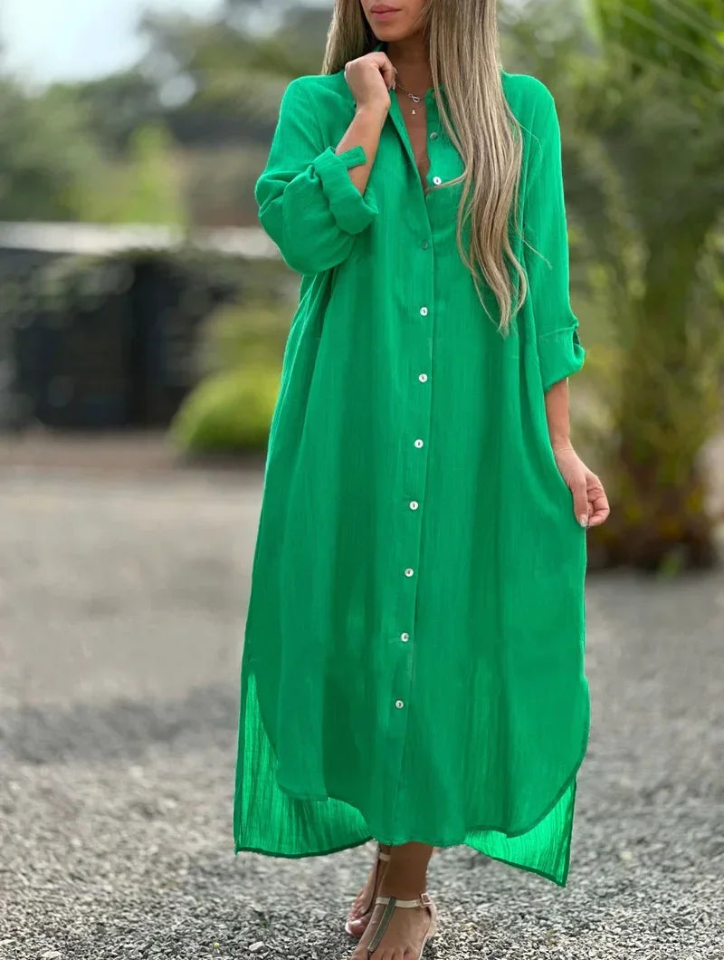 Women's elegant long sleeve flowy maxi dress, perfect for a chic summer look or vacation wear.