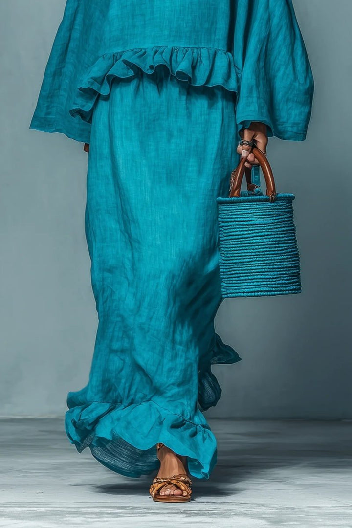 Women's two-piece set: A flowy ruffle maxi skirt paired with a chic cape top. Relaxed fit, perfect for summer casual.