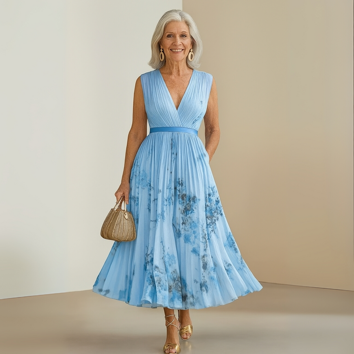 Chic sleeveless maxi dress for women. A flowy long dress, perfect for summer travel or beach days.