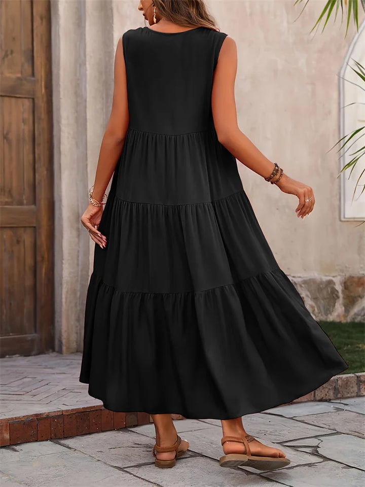Women's long tiered summer dress, flowy and breathable, ideal for sunny days.