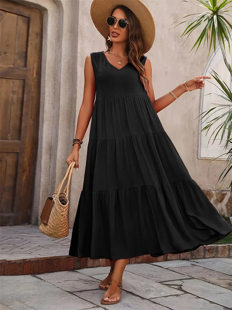Comfortable women's tiered maxi summer dress, great for beach, casual, or vacation.
